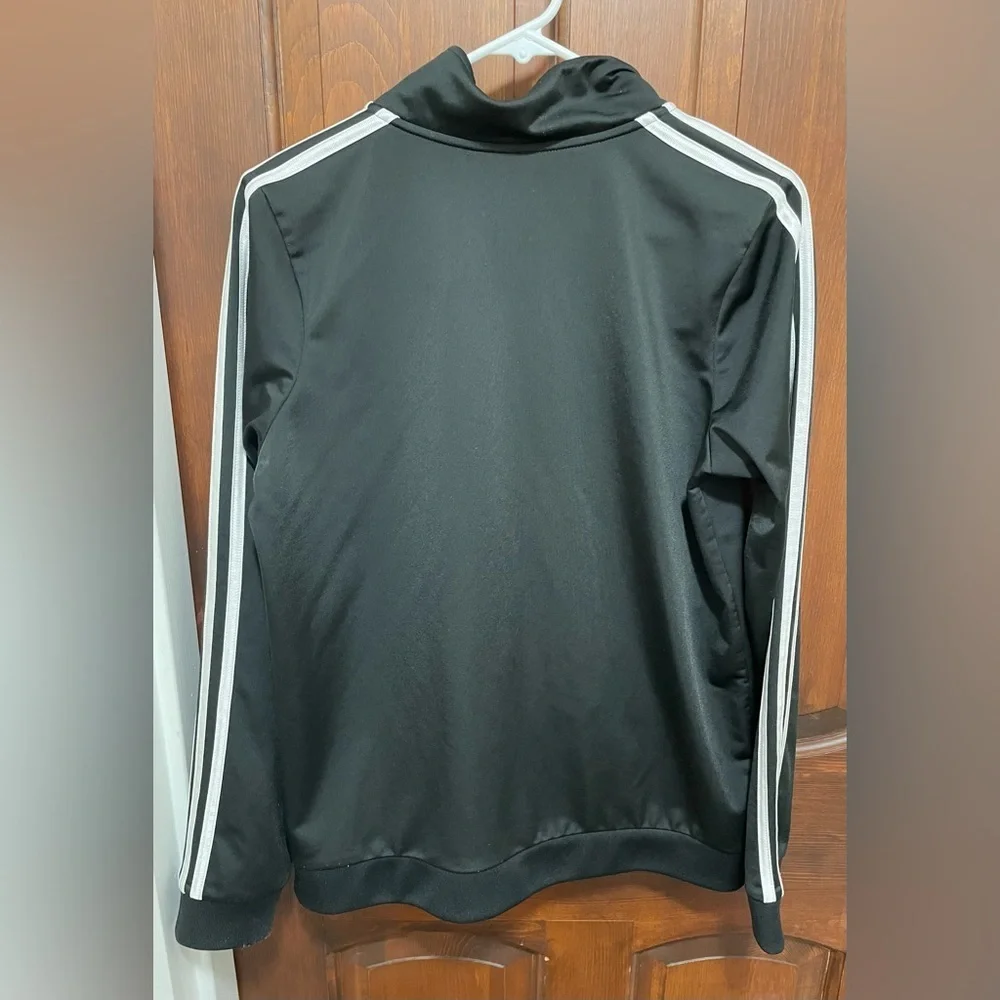 Adidas women’s ( Unisex) Black with White stripes Track Jacket size XL(18/20)